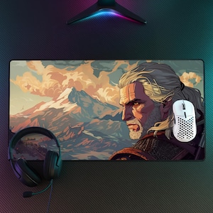 May include: A rectangular gaming mouse pad featuring a detailed illustration of a man with long white hair and a mountain landscape background. A white mouse and black headset are also visible. The pad is designed for computer use.