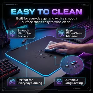 May include: A black gaming mouse mat with a blue and purple illuminated edge. The text "EASY TO CLEAN" is at the top. The mat has a smooth microfiber surface and is easy to wipe clean. The text "Perfect for Everyday Gaming" is also visible.