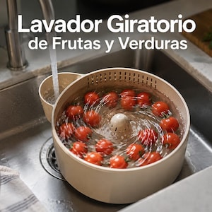 May include: A beige circular fruit and vegetable spinner containing red cherry tomatoes submerged in water. The device features a central drainage cone and a side handle, with the text Lavador Giratorio de Frutas y Verduras visible above.