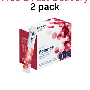 Pode incluir: Uma caixa de suplemento alimentar Unicity Balance e uma saqueta individual. A embalagem &eacute; branca e vermelho-escura com um padr&atilde;o circular. O texto inclui Unicity Balance, The smart solution to balanced nutrition, Mixed Berry Flavor e Net Wt. 223 g.