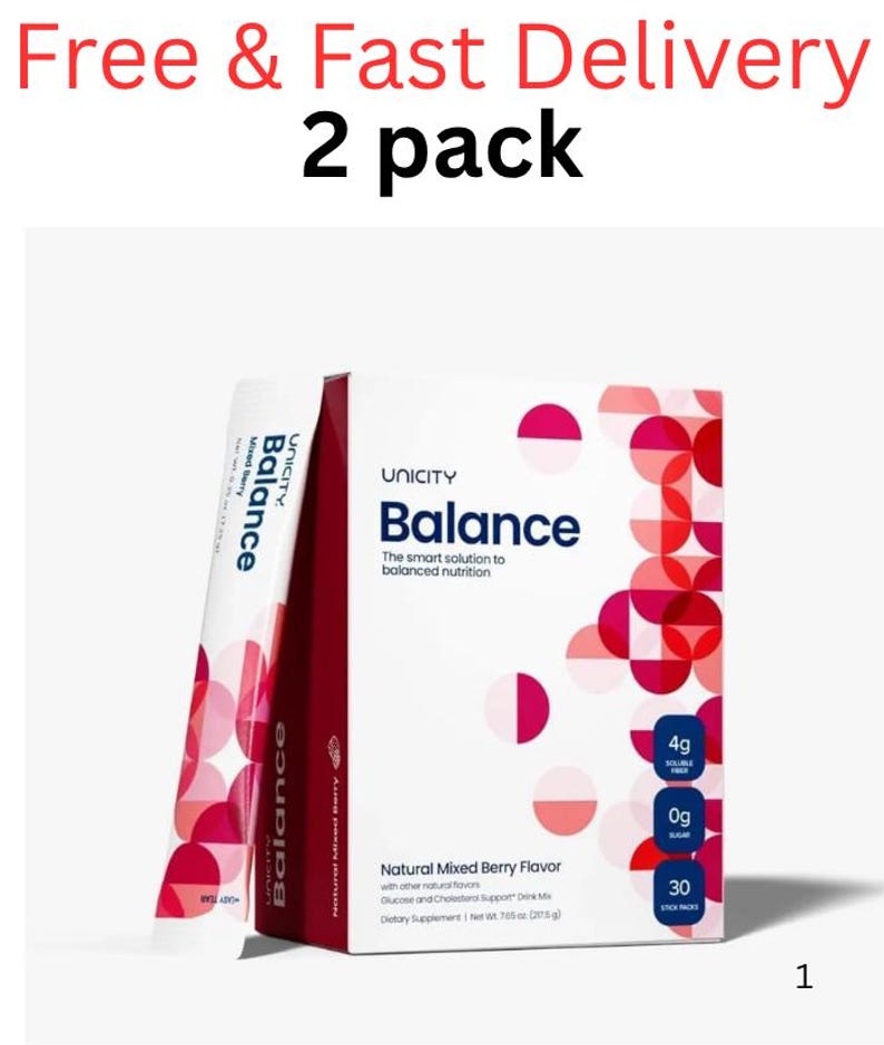 Pode incluir: Um pacote com 2 caixas de suplemento alimentar Unicity Balance sabor frutas vermelhas. A embalagem branca apresenta texto azul escuro, padr&otilde;es circulares vermelhos e rosas, e r&oacute;tulos indicando 4g de fibra, 0g de a&ccedil;&uacute;car e 30 sach&ecirc;s.