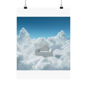 May include: A white sofa with a tufted back and a decorative pillow, set against a backdrop of fluffy white clouds and a bright blue sky. The image is a print, mounted on a white background.
