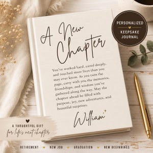 May include: A cream-colored hardcover journal featuring the black printed text A New Chapter followed by a sentimental paragraph and the name William. A circular badge in the top right corner reads Personalized Keepsake Journal with a small heart icon.