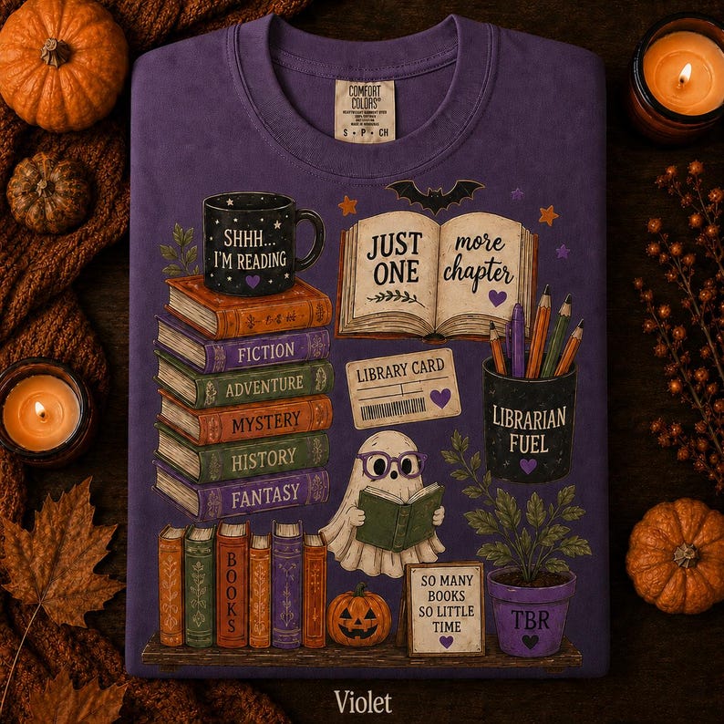May include: A purple crewneck t-shirt featuring a graphic print of stacked books labeled Fiction, Adventure, Mystery, History, and Fantasy. It includes a ghost reading a book, a mug labeled Shhh... I'm Reading, and a pot labeled Librarian Fuel.