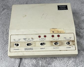 Tandy 26-2820 printerinterfaceselector 2 parallelle poorten, niet getest