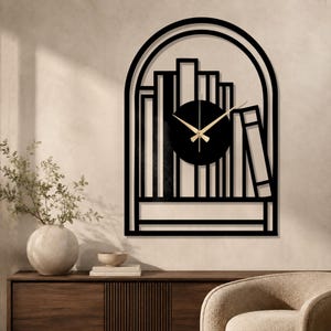 Relógio de parede em metal com estante de livros, decoração para biblioteca e cantinho de leitura para amantes de livros.