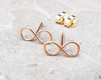 simple stud earrings with infinity signs. Infinite stud earrings made of noble rosé gold filled. Forever and ever.