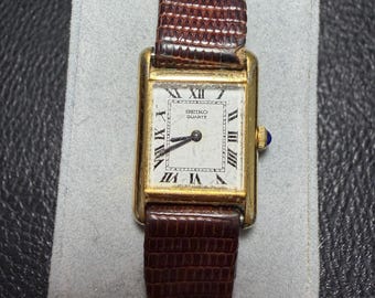 Rare 1980 Seiko Tank Dress Watch White Roman Dial Gold Tone Rectangle 17mm 1400-5039 (new battery)