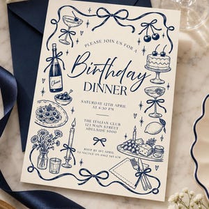 Peut inclure: Une carte d'invitation pour un dîner d'anniversaire couleur crème avec des illustrations à l'encre bleu foncé représentant une bouteille de champagne, un gâteau, des pâtes, des fruits et des bougies. Le texte indique : Please join us for a Birthday Dinner, Saturday 12th April at 6:30 PM, The Italian Club, 123 Main Street, Adelaide 5000, RSVP by 1st April to Nicole on 0412 345 678.