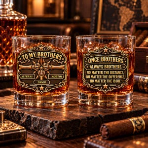 May include: Two clear glass whiskey tumblers filled with amber liquid and ice. The left glass features a fist bump graphic with the text TO MY BROTHERS, JEFFRAY, AUSTIN, and DAVID. The right glass displays the text ONCE BROTHERS, ALWAYS BROTHERS, NO MATTER THE DISTANCE, NO MATTER THE DIFFERENCE, NO MATTER THE ISSUE.