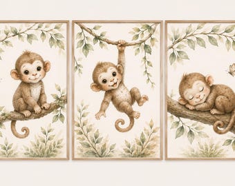 May include: A set of three framed wall art prints featuring watercolor illustrations of brown monkeys in a jungle setting. The monkeys are depicted sitting, hanging from a branch, and sleeping, surrounded by green leaves and small butterflies.