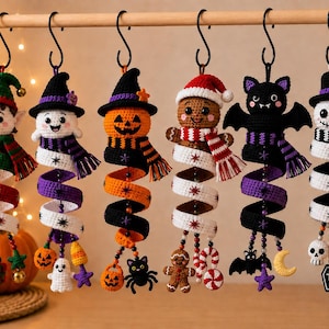 May include: Six crocheted hanging ornaments featuring an elf, a ghost, a pumpkin, a gingerbread person, a bat, and a skeleton. Each figure wears a hat and scarf, attached to a colorful spiral tail decorated with small charms like stars and candy.
