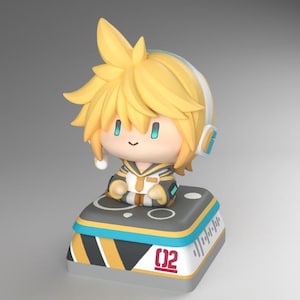 May include: A chibi-style figurine featuring a character with spiky yellow hair, teal eyes, and white headphones. The figure wears a white and black sailor-style outfit and sits on a square base with yellow and black stripes and the red number 02.