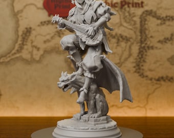 May include: A light gray resin miniature figurine of a jester-like character wearing a mask and playing a lute. The figure stands atop a winged gargoyle creature, both mounted on a circular base. The character wears layered clothing and a cape.