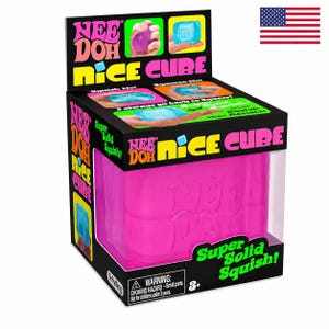 May include: A Nee Doh Nice Cube toy in a black cardboard display box. The box features bright pink and yellow text, including the product name and the phrase Super Solid Squish. The cube itself is a vibrant pink with the Nee Doh logo embossed.