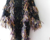 RESERVED for J L Extravagnt handknitted coat for a yeti woman,long,open in black yarn,colored bows and long colored fur,by LAMAMADESMATOUS