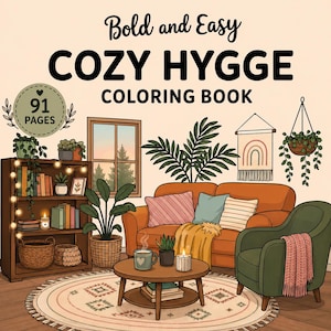 May include: A coloring book titled Bold and Easy COZY HYGGE COLORING BOOK with 91 PAGES. The cover illustration features a living room with an orange sofa, green armchair, wooden bookshelf, coffee table, plants, and a wall hanging with a rainbow.