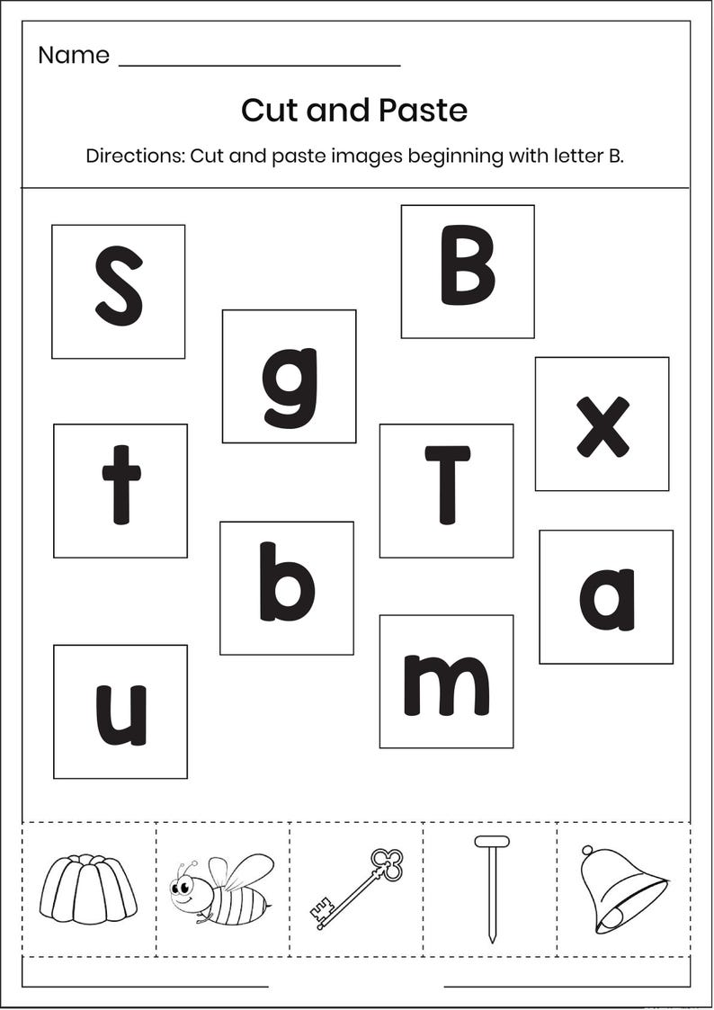 May include: A black and white educational worksheet titled Cut and Paste with directions to cut and paste images beginning with letter B. It features a grid of letters including S, g, B, t, T, x, b, a, u, m and a bottom row of illustrations: jelly, bee, key, nail, and bell.