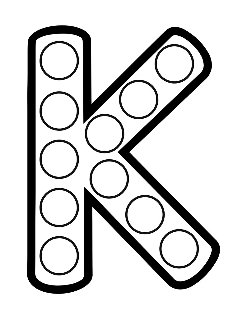 Black and white outline of the uppercase letter K filled with circular dot marker spaces.