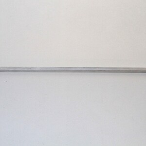 May include: A silver metal rod with a threaded end.