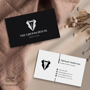 Könnte beinhalten: Zwei rechteckige Visitenkarten. Eine ist schwarz mit einem weißen Smoking-Symbol und dem Text THE GROOM HOUSE Styled for Forever. Die andere ist weiß mit einem schwarzen Smoking-Symbol, dem Namen Michael Anderson und dem Titel Founder & Style Consultant.