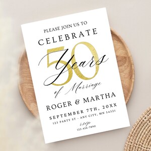 May include: A white invitation card with black text announcing a 50th wedding anniversary celebration for Roger and Martha. The invitation includes the date, time, and location of the event. The text "50 Years of Marriage" is written in gold script.