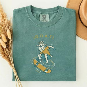 Skateboarder Gift for Dad, Greatest of All Time Shirt, Funny GOAT Tee, Comfort Colors Skateboard Shirt, Gift for Skater Light Green