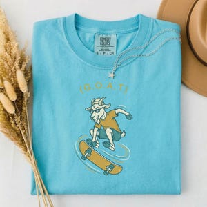 Skateboarder Gift for Dad, Greatest of All Time Shirt, Funny GOAT Tee, Comfort Colors Skateboard Shirt, Gift for Skater Lagoon Blue