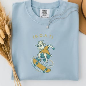 Skateboarder Gift for Dad, Greatest of All Time Shirt, Funny GOAT Tee, Comfort Colors Skateboard Shirt, Gift for Skater Chambray