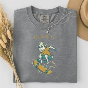 Skateboarder Gift for Dad, Greatest of All Time Shirt, Funny GOAT Tee, Comfort Colors Skateboard Shirt, Gift for Skater Grey