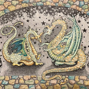 May include: Two detailed pencil drawings of dragons facing each other. The dragons are green, blue, and yellow with intricate scales and wings. The dragons are set against a background of a stone archway and a starry night sky.