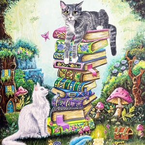 May include: An illustrated painting of a gray tabby cat perched atop a stack of colorful books. A white cat sits below, with a whimsical forest scene featuring mushrooms, a snail, and a treasure chest.