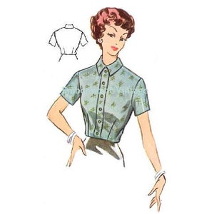 May include: A vintage sewing pattern for a short-sleeved blouse with a button-up front and a collar. The pattern includes a line drawing of a woman wearing the blouse.