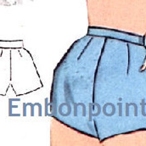 May include: A pair of blue high-waisted shorts with a wide waistband. The shorts have a curved hemline and are made of a smooth fabric.