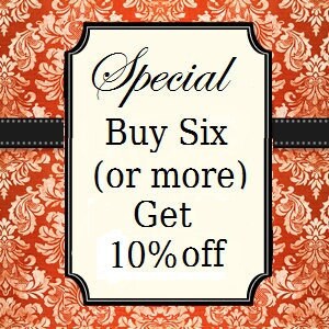 May include: A white sign with a black border and black text that reads "Special Buy Six (or more) Get 10% off".