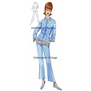 May include: A vintage sewing pattern illustration of a woman wearing a blue patterned blouse and matching pants. The illustration is in a retro style and features a simple design.