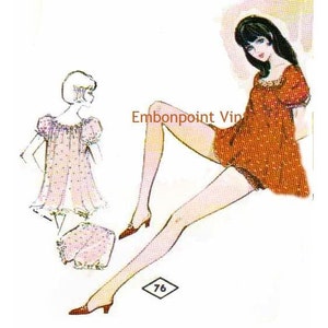 May include: Vintage sewing pattern for a nightgown with a lace trim. The pattern includes a short-sleeved top and a matching bottom. The pattern is illustrated with a woman wearing the nightgown.