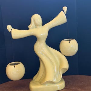 Chartreuse MCM “Water Carrier” pottery figure with both hanging pots