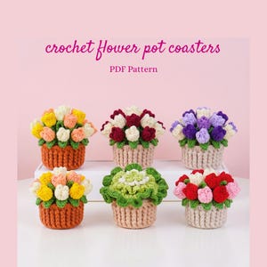 May include: Six crochet flower pot coasters arranged in two rows. The text reads crochet flower pot coasters PDF Pattern. The coasters feature various colored yarn flowers in textured pots, including yellow, orange, red, white, and purple.