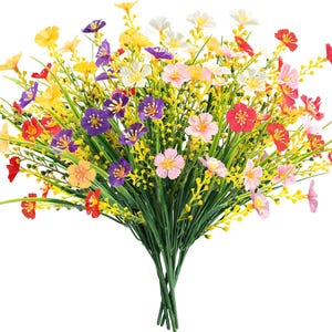 Pode incluir: Um ramo de flores artificiais com uma mistura vibrante de flores roxas, amarelas, cor-de-rosa, vermelhas e brancas. O arranjo inclui caules verdes finos e pequenos bot&otilde;es amarelos, criando uma exibi&ccedil;&atilde;o floral densa e multicolorida.