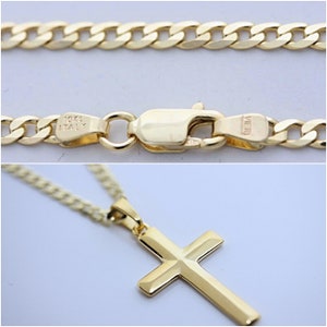 Catena a maglie in oro massiccio 10k da 3,1 mm. Con oro 12k su argento Sterling Larghezza della croce: 0,79&quot;x 1,61&quot; Seleziona catena Catena da 20 e 24&quot;. R-80