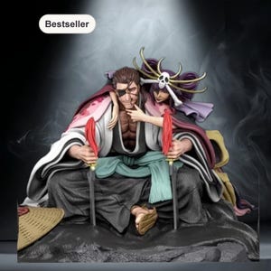 Peut inclure: Une figurine détaillée en résine représentant un personnage masculin assis avec un cache-œil et un personnage féminin aux cheveux violets avec un accessoire de crâne reposant derrière lui. Ils portent des robes japonaises et tiennent des épées.