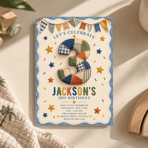 May include: A rectangular birthday invitation card featuring a large number 3 with a patchwork quilt pattern. The text reads: LET'S CELEBRATE, JACKSON'S 3RD BIRTHDAY, JOIN US TO CELEBRATE, SATURDAY, MAY 17TH, 2:00 - 5:00 PM, THE GARDEN HOUSE, 123 MAPLE DRIVE, AUSTIN, TX, RSVP 555-489-1245. The card is decorated with colorful bunting and stars.