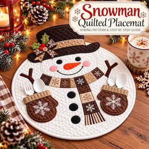 May include: A round white quilted placemat featuring a snowman design with a brown hat, a brown and tan checkered scarf, and two brown mittens with white snowflake embroidery. The placemat includes pockets for utensils and text reading Snowman Quilted Placemat SEWING PATTERN & STEP BY STEP GUIDE.