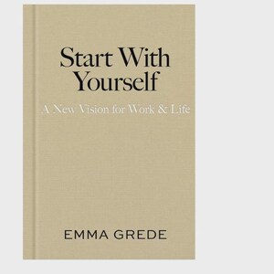 May include: A hardcover book with a light tan, textured fabric cover. The title 'Start With Yourself' is printed in black serif font, followed by the subtitle 'A New Vision for Work & Life' in white, and the author name 'EMMA GREDE' in black.