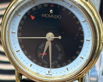 Reloj Movado para mujer de 28 mm con indicador de fecha. Finales de los años 80. Ref. 87.06.825. Movimiento ETA 255.495. Cuarzo ETA.