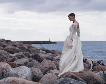 White satin heavily beaded lace low back long train wedding dress bridal gown