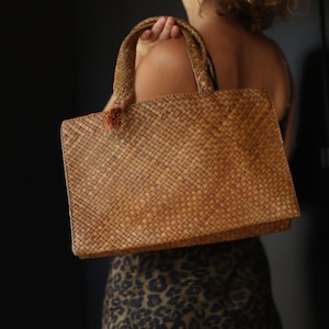 Vintage brown natural straw woven medium sized market beach tote basket bag