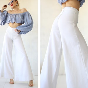 Off white bell bottom pants best sale