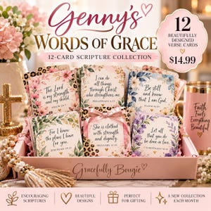 May include: A collection of 12 square verse cards titled Genny's Words of Grace, featuring floral and leopard print designs with scripture text. The cards are displayed in a light pink box, accompanied by a pink tumbler and a gold cross ornament.